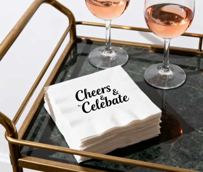 Stack of personalized cocktail napkins with a cute couple inside joke printed on them