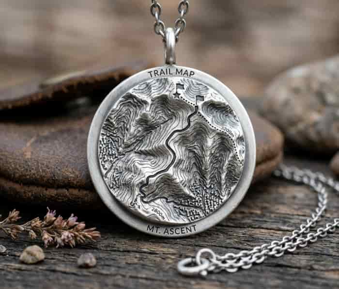 Silver circular 3D topographic trail map pendant necklace