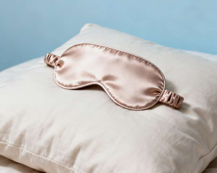 High-quality silk sleep mask on pillow