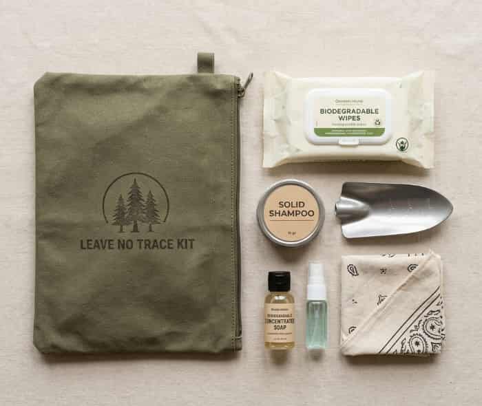 Leave-no-trace wilderness kit with biodegradable wipes and solid shampoo