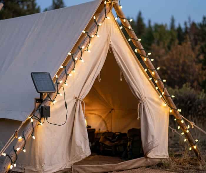 Solar-powered shatterproof fairy lights wrapped around a tent entrance