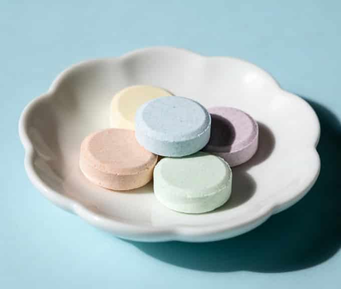 Aromatherapy shower steamer tablets in a bowl