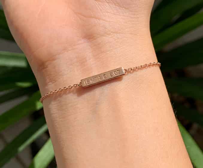 Delicate bracelet with engraved coordinates charm