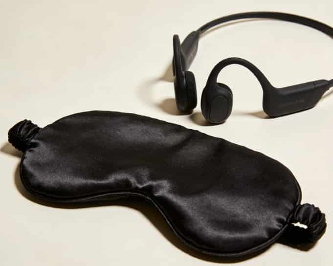 Black silk sleep mask with built-in headphones