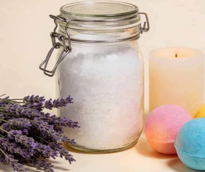 Epsom salt bath soak with lavender and candle