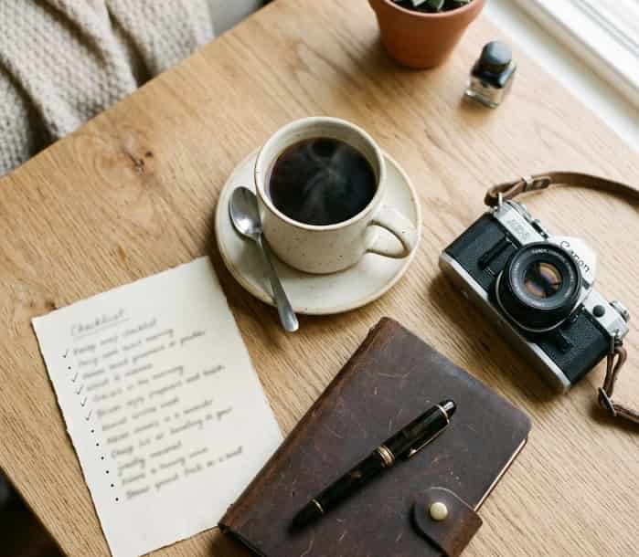 desk flat lay with thoughtful gifts for different girlfriend personalities and matching checklist