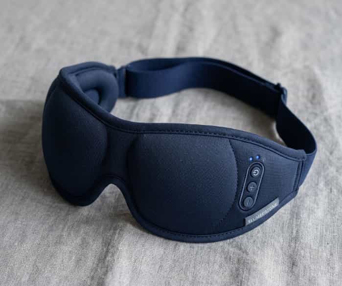 Contoured sleep mask with built-in Bluetooth headphones