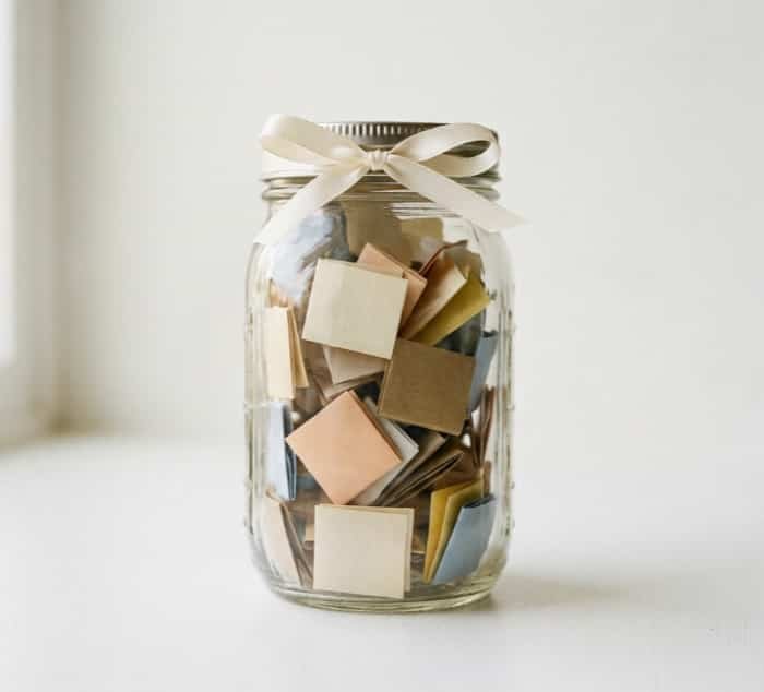DIY memory jar filled with handwritten love notes for girlfriend